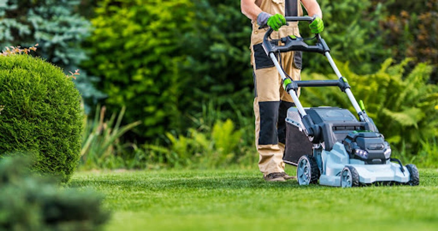 Someone mowing the lawn.