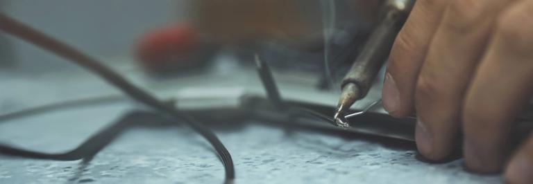 person soldering