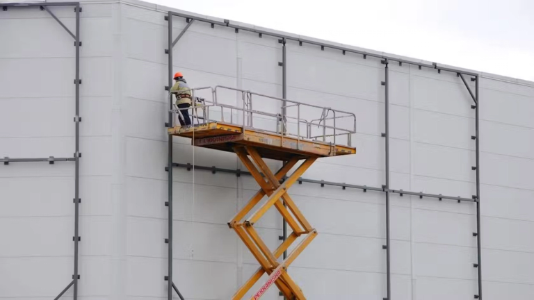 Someone working at height on a construction site.