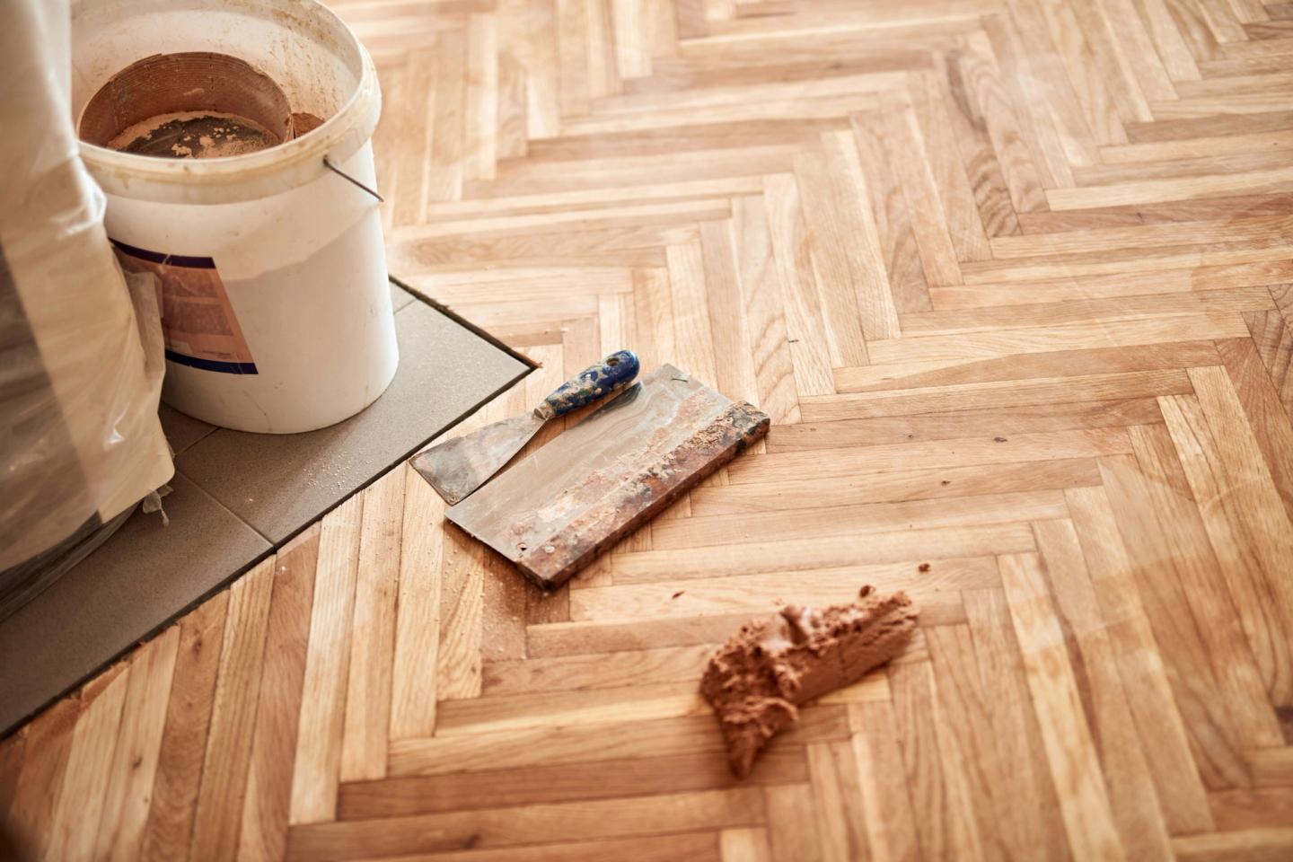 wooden floorboards in herringbone style pattern