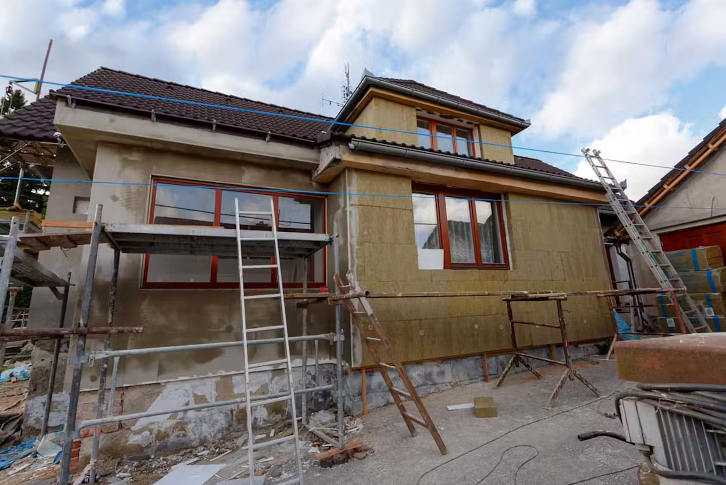 A house undergoing construction work.
