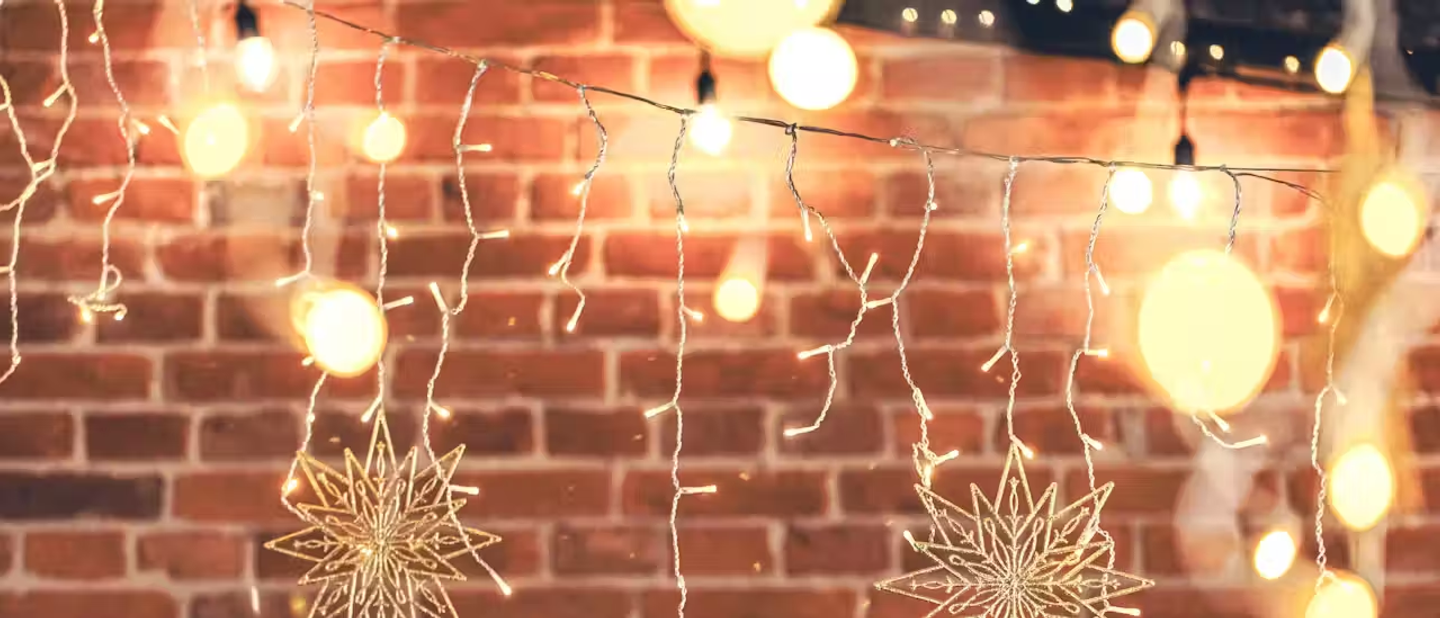 Christmas lights hanging in a room