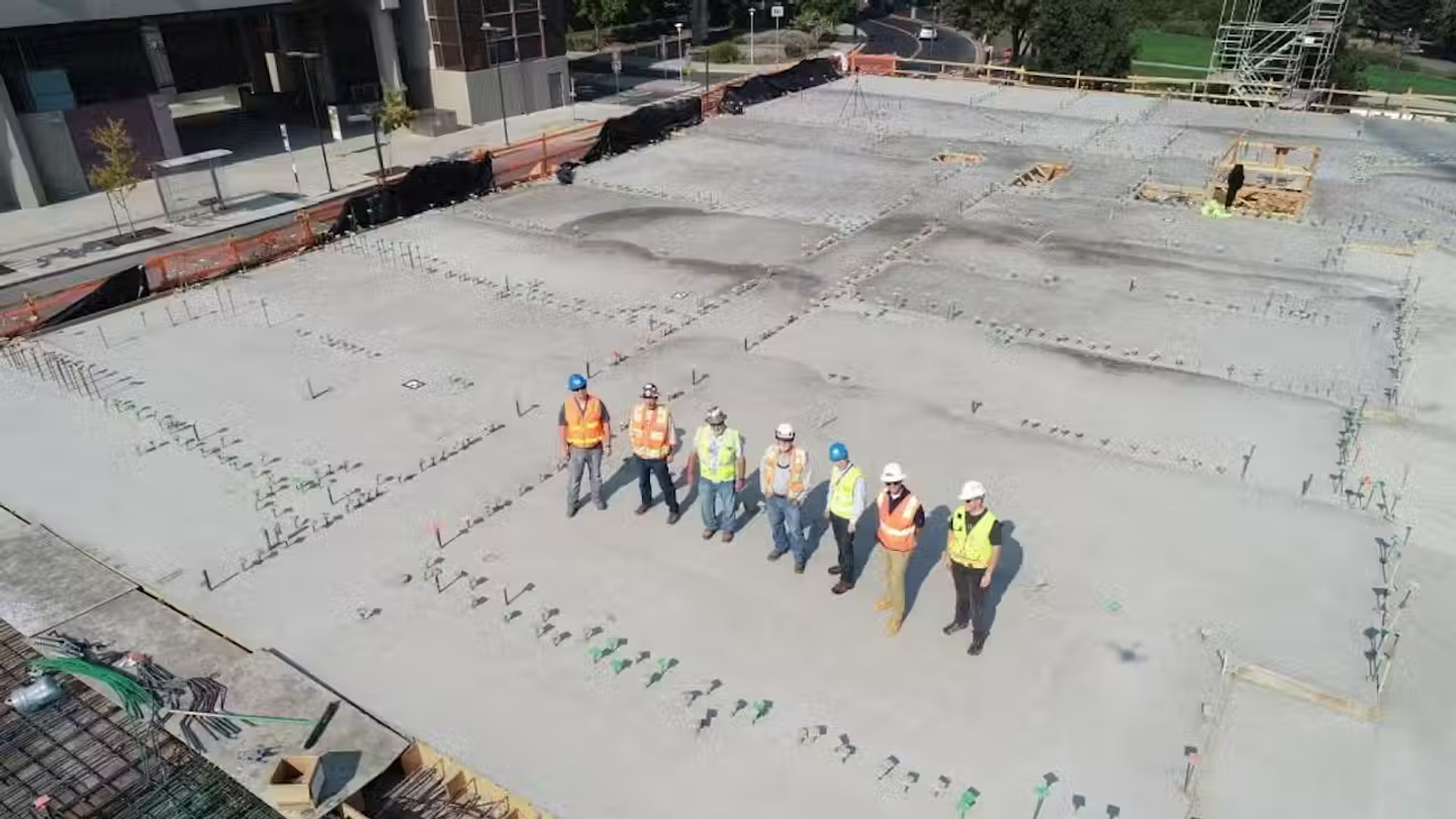 Construction workers on a sunny work site