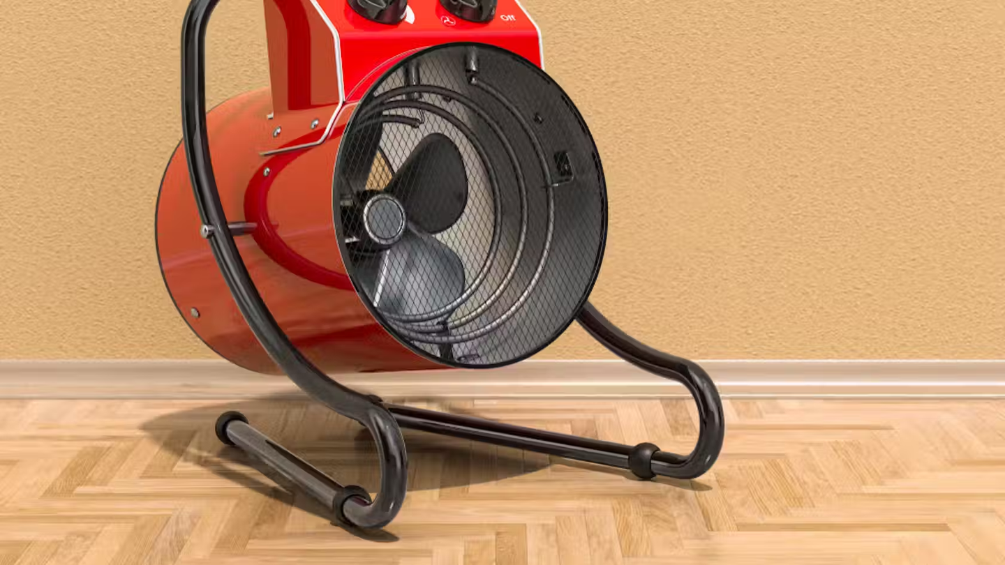 A red fan heater.