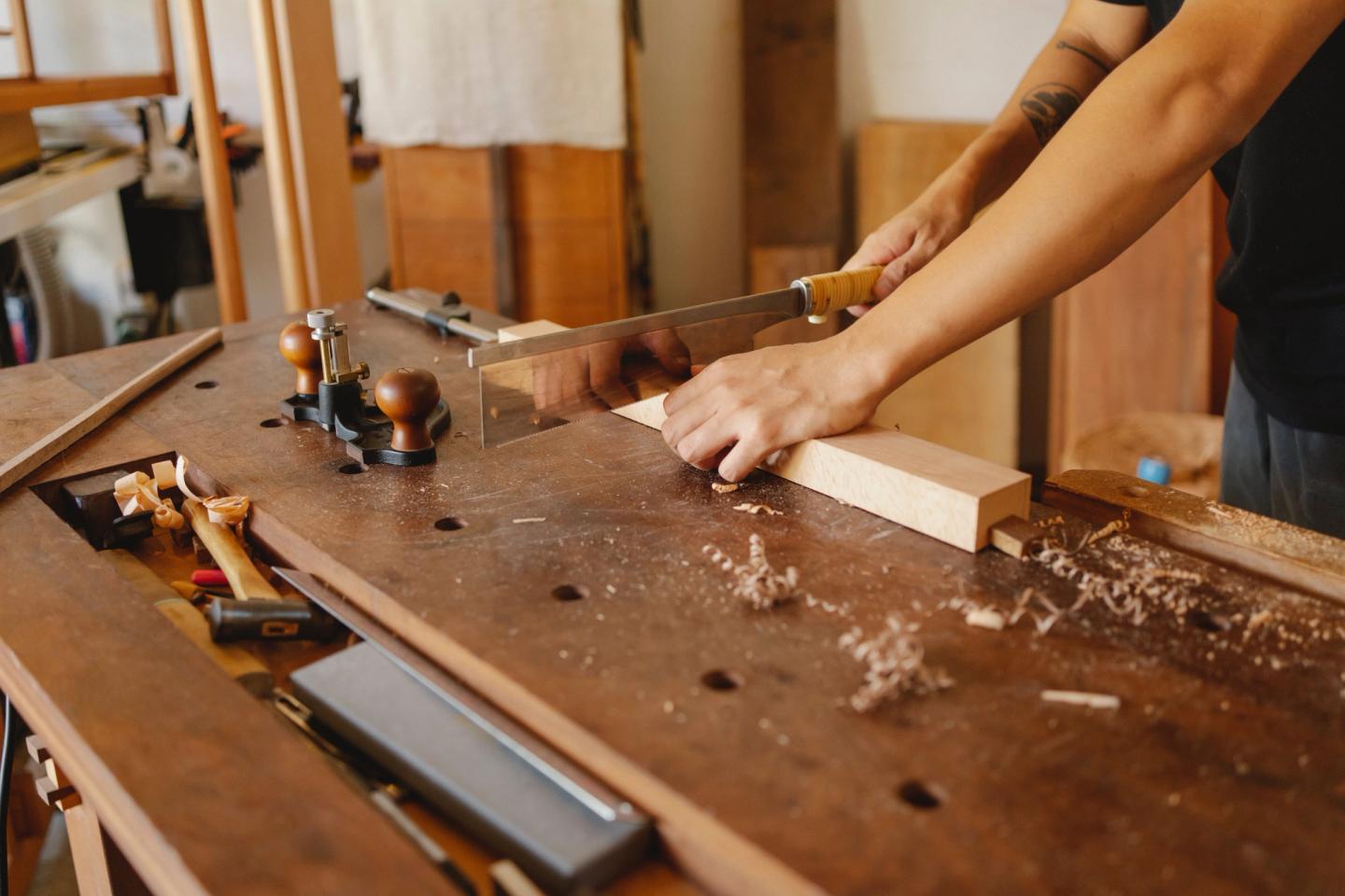 wood cutting using hand saw