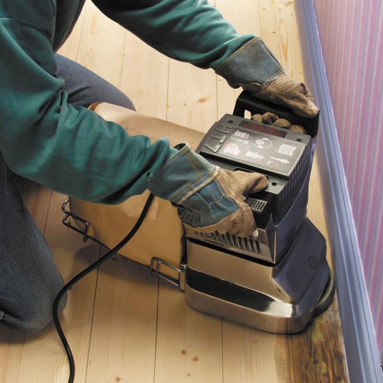 Someone using an edging sander.