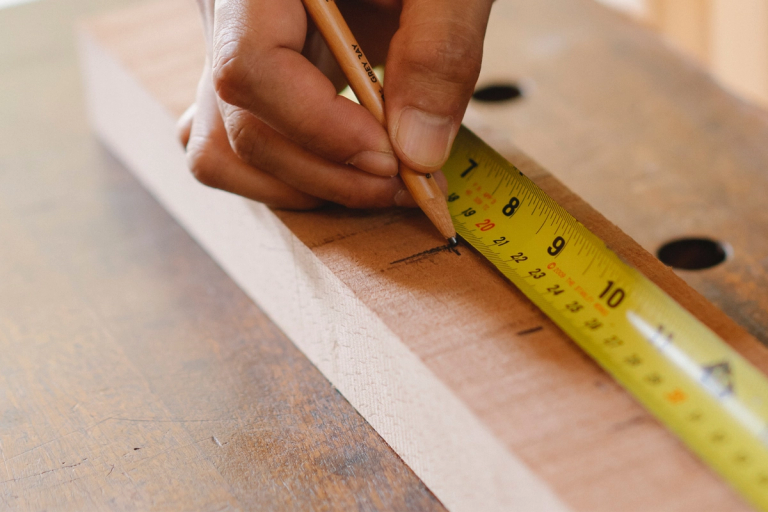 marking tape measured measurements with pencil