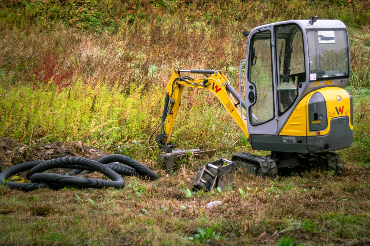mini digger in use