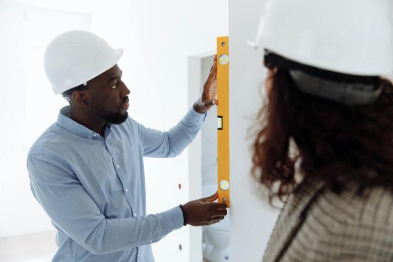 man with a spirit level