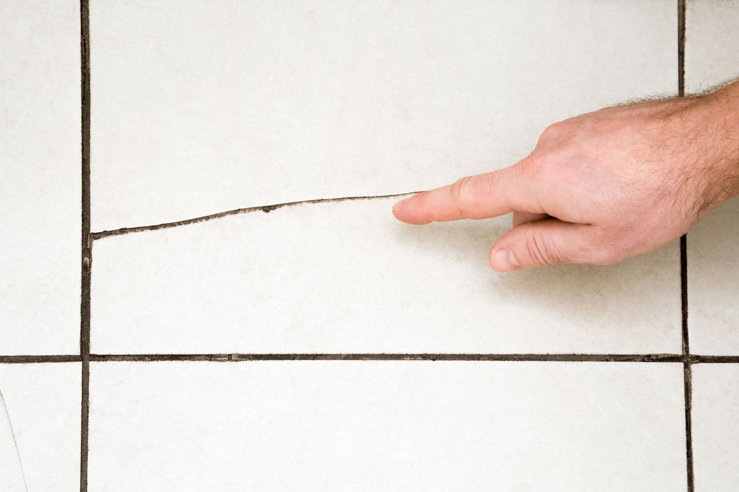 a cracked floor tile