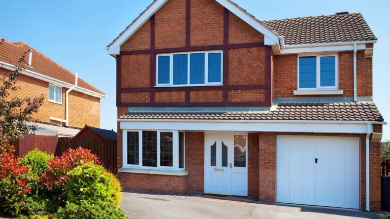 Front view of a house and garage.