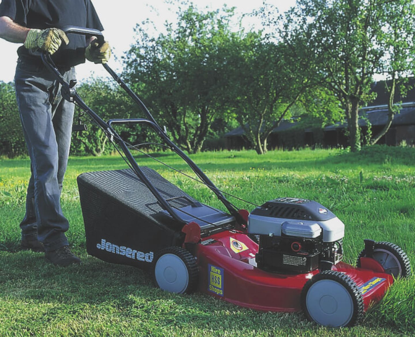 man using floor sander