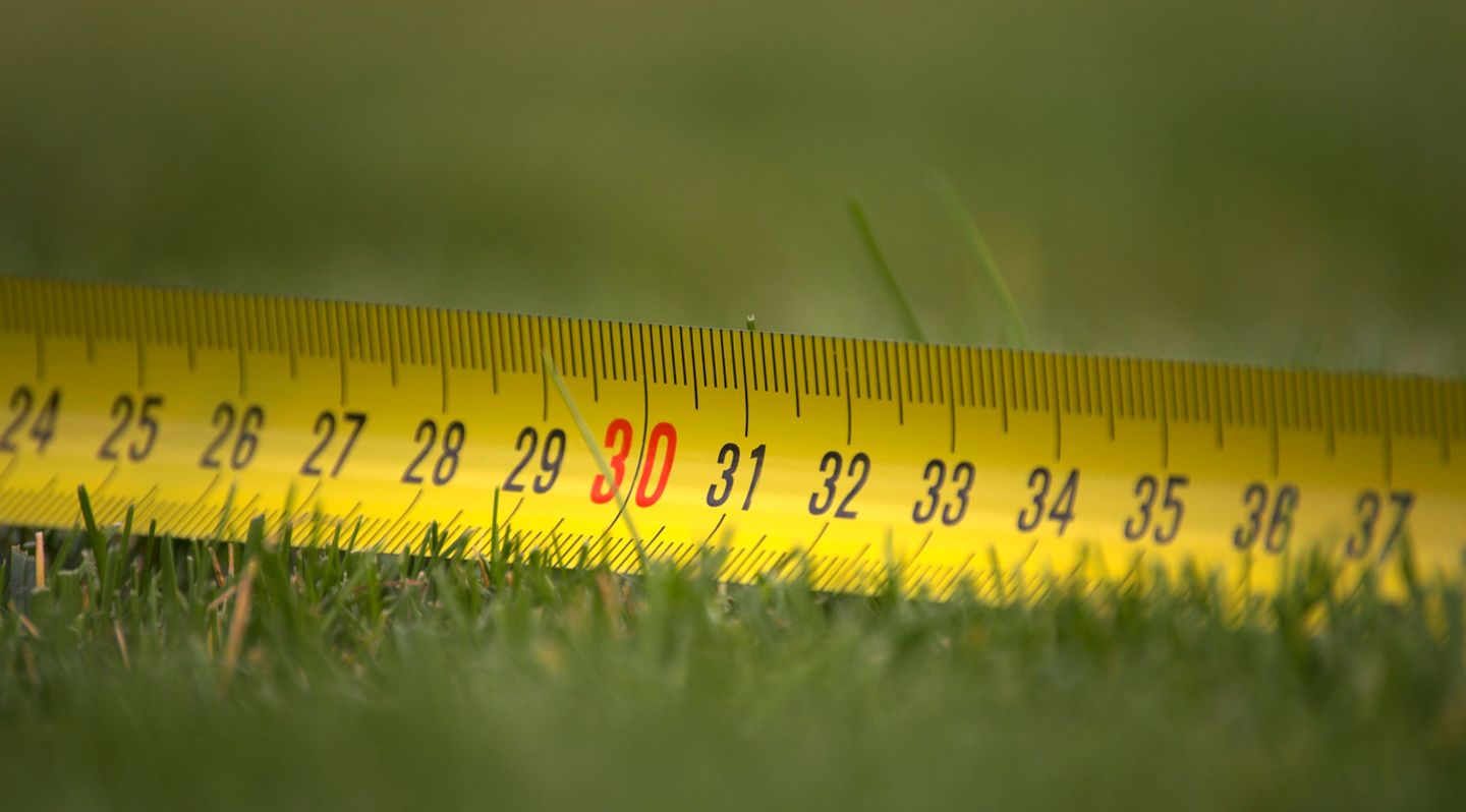 measuring tape on the grass