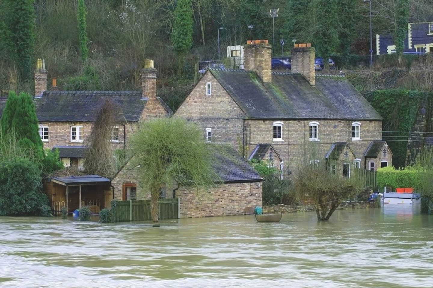 A flooded brick houses in the UK British village