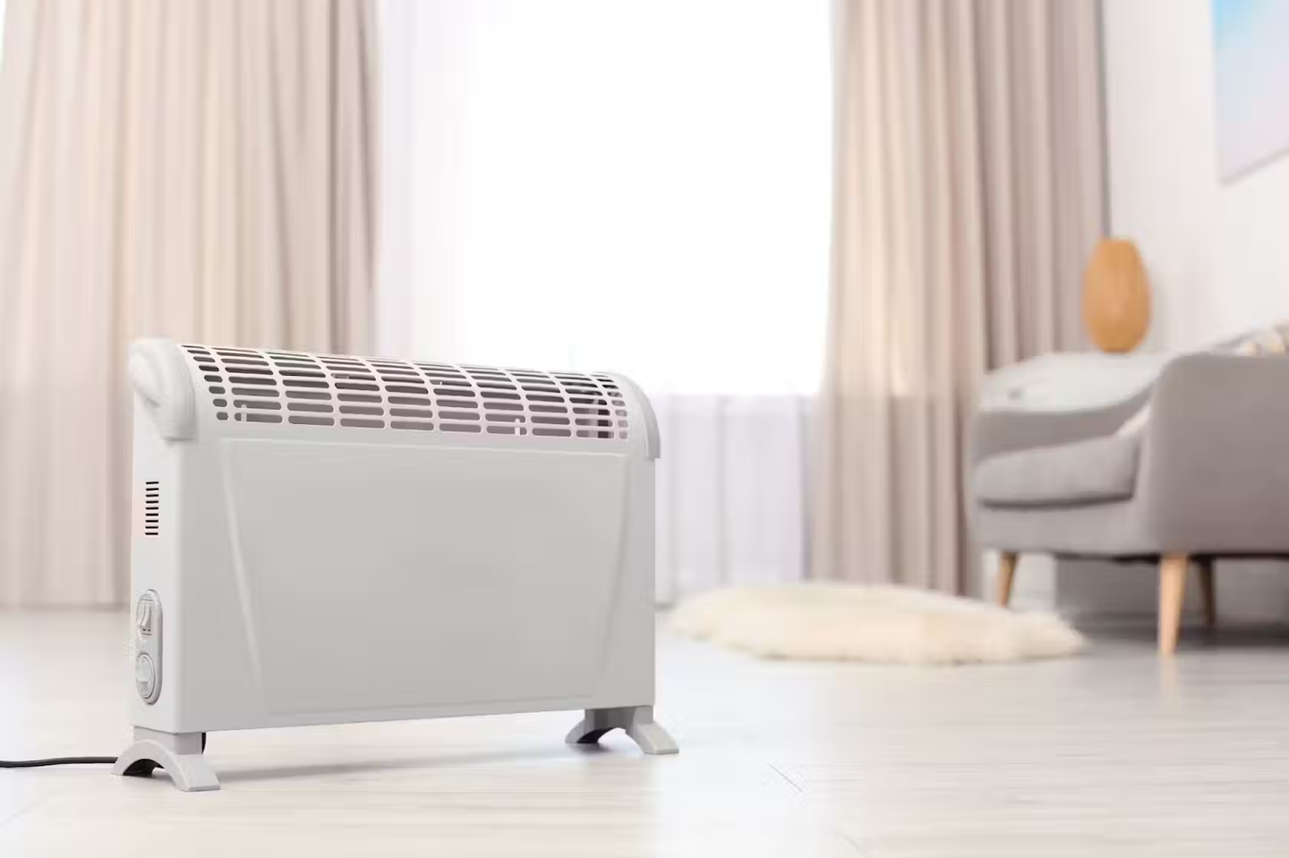 An electric heater placed in a living room