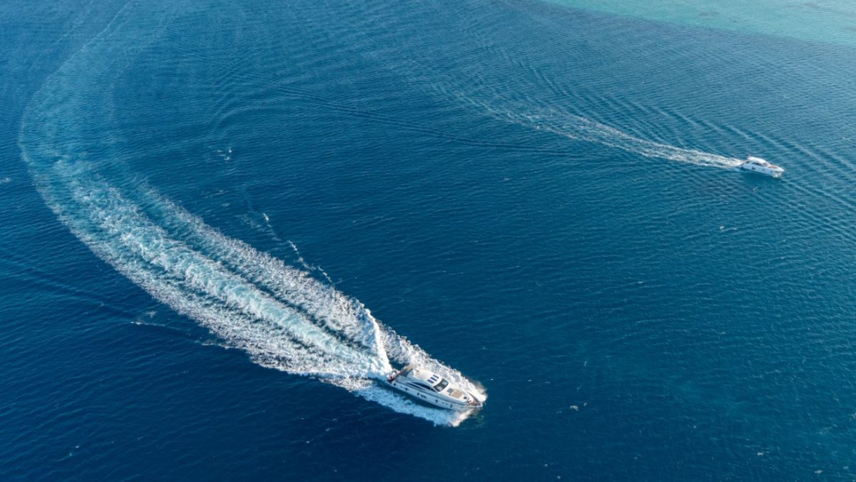 yacht and speedboat