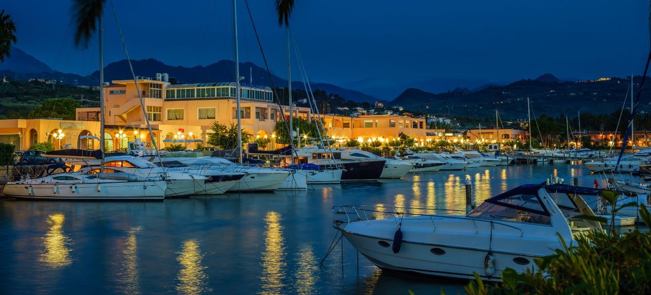 Touristic port at night, Portorosa, Sicily