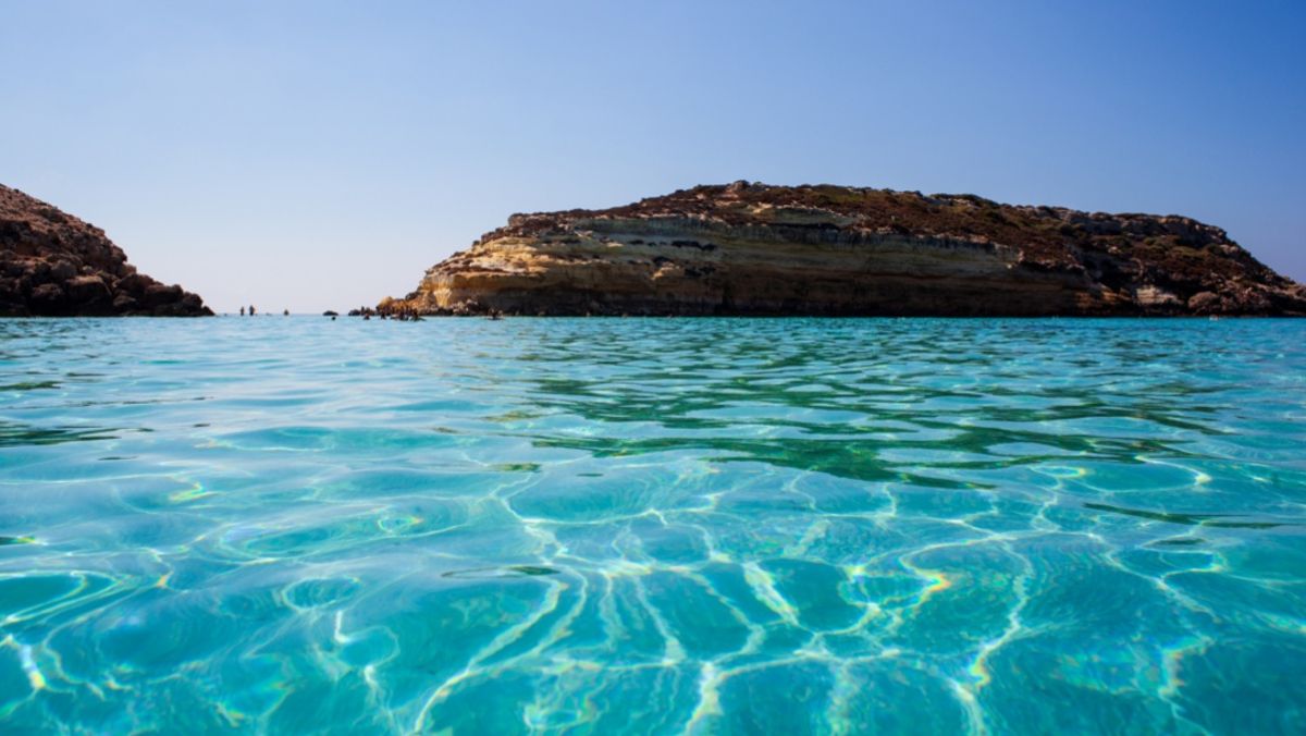 View of the most famous sea place of Lampedusa, It is named Spiaggia dei conigli, in English language Rabbits Beach or Conigli island