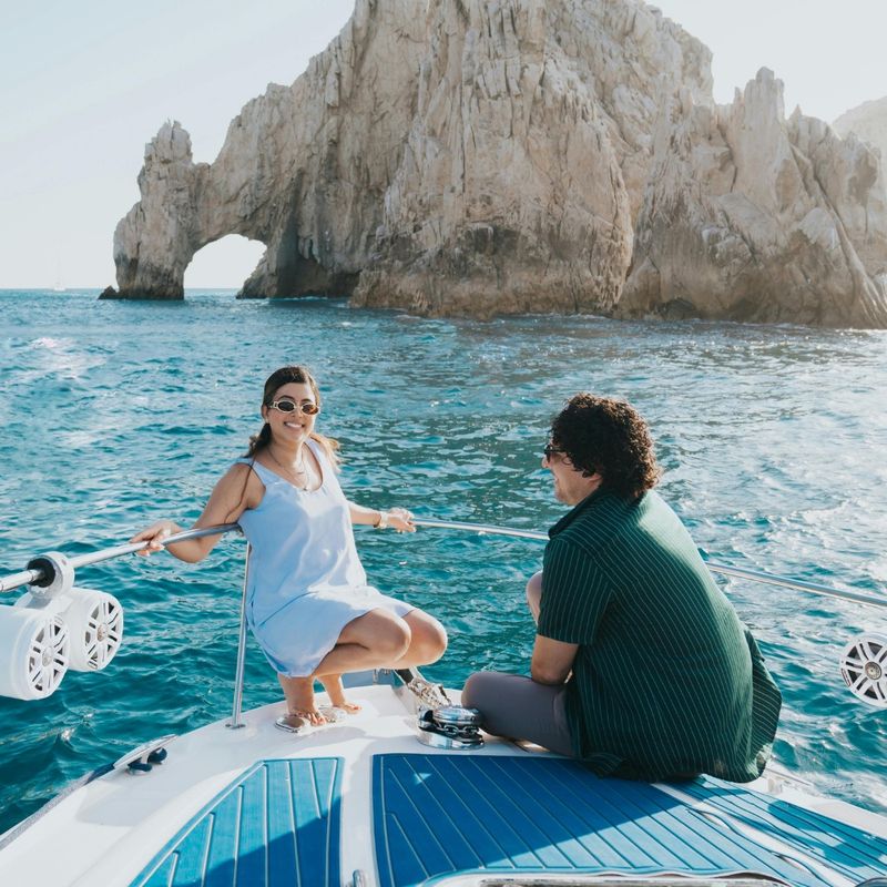 Couple Enjoying Yacht Cruise Near Cabo Arch