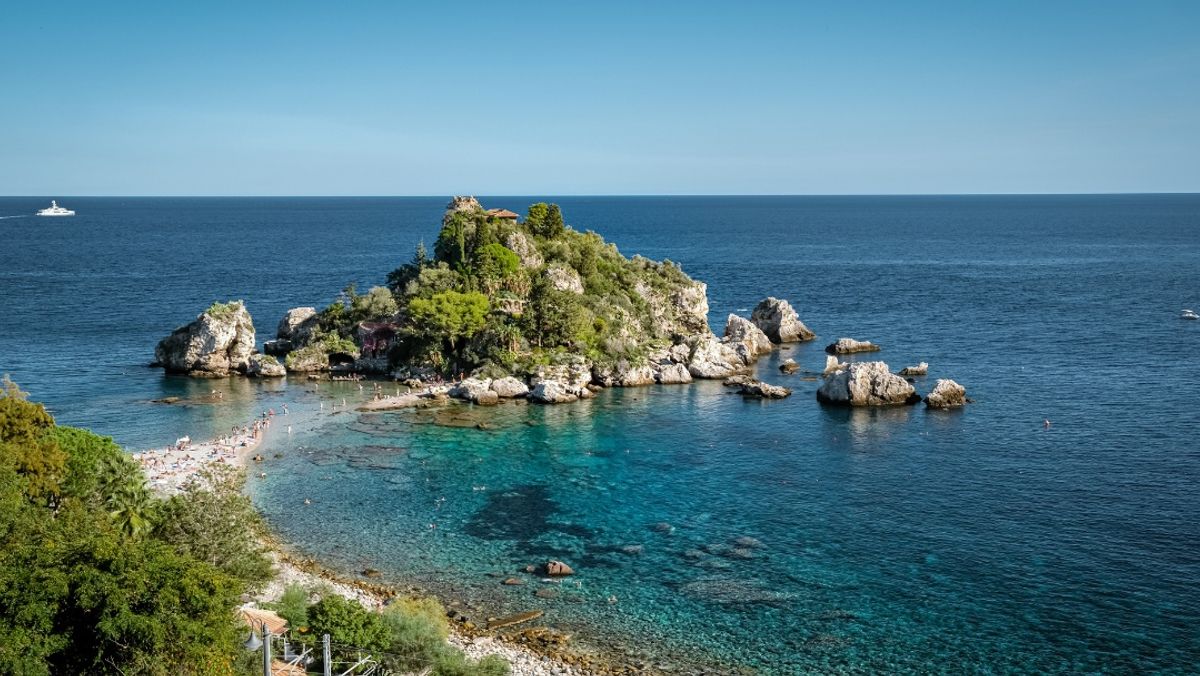 Isola Bella at Taormina, Sicily, Aerial view of island and Isola Bella beach and blue ocean water in Taormina, Sicily, Italy