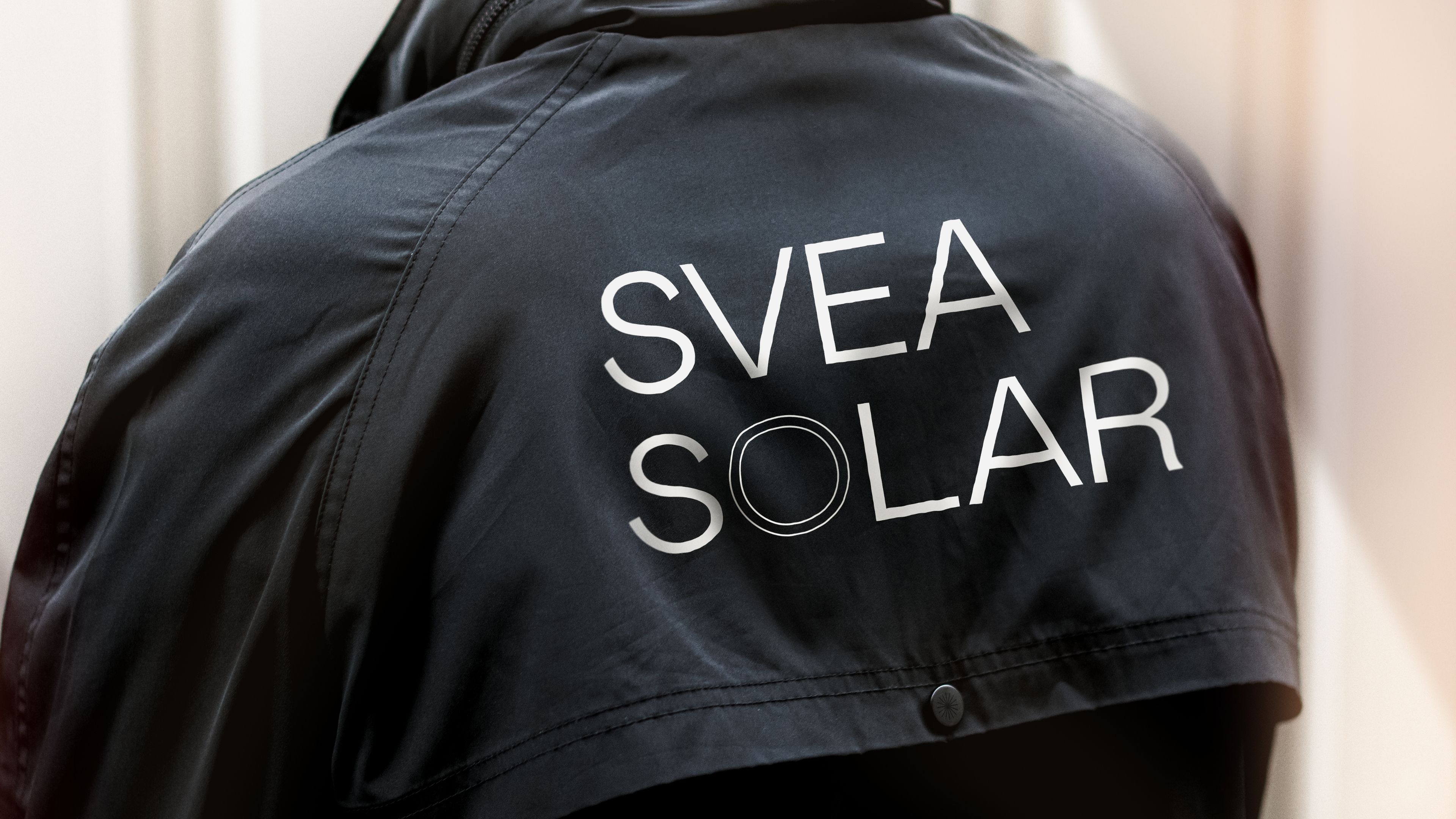 An image of a Svea Solar coat with the logo on it