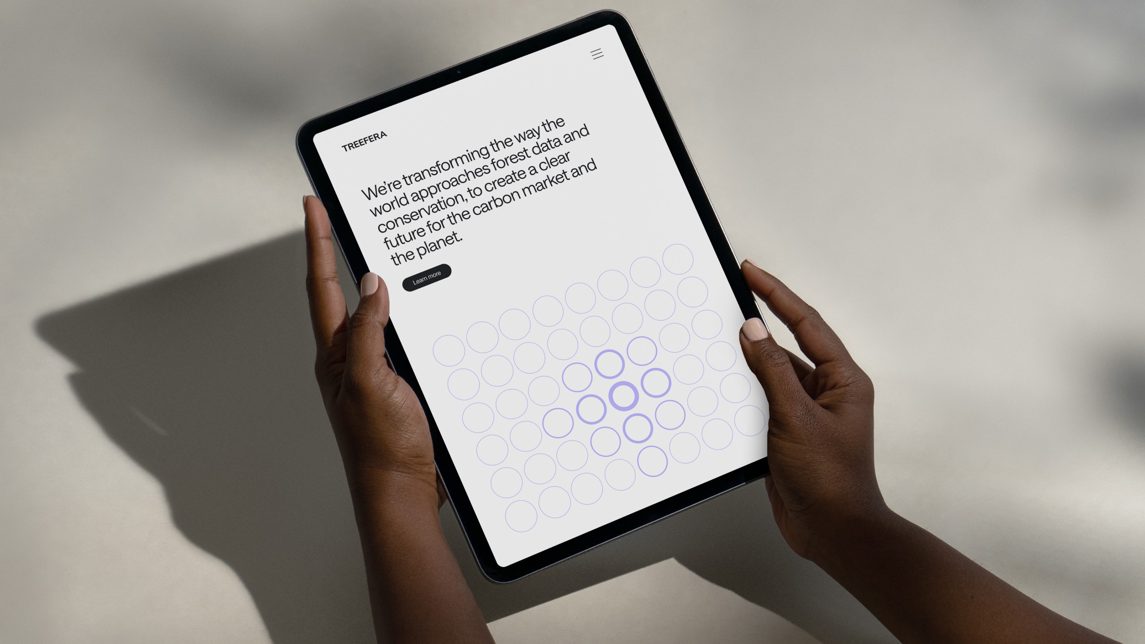 An image of Treefera marketing website in an ipad showing ui and ux