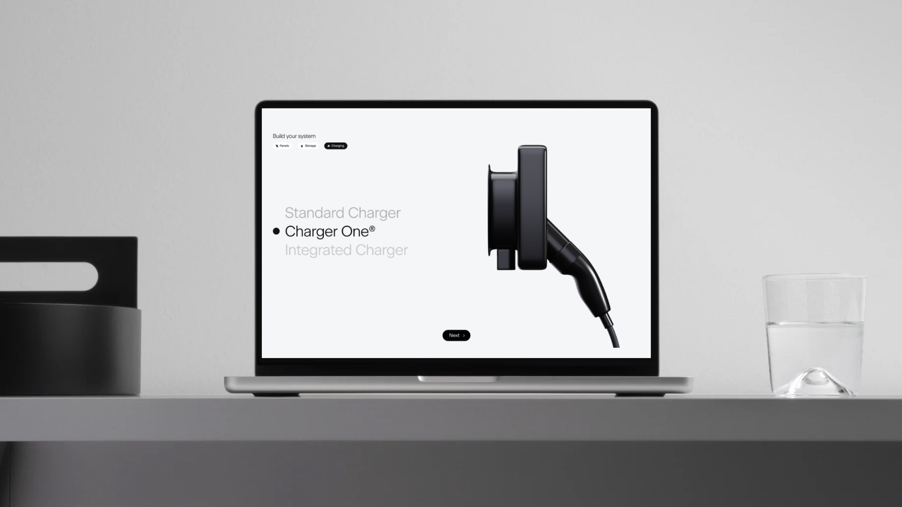 An image of Svea Solar marekting site showing a charger in a macbook pro on a desk