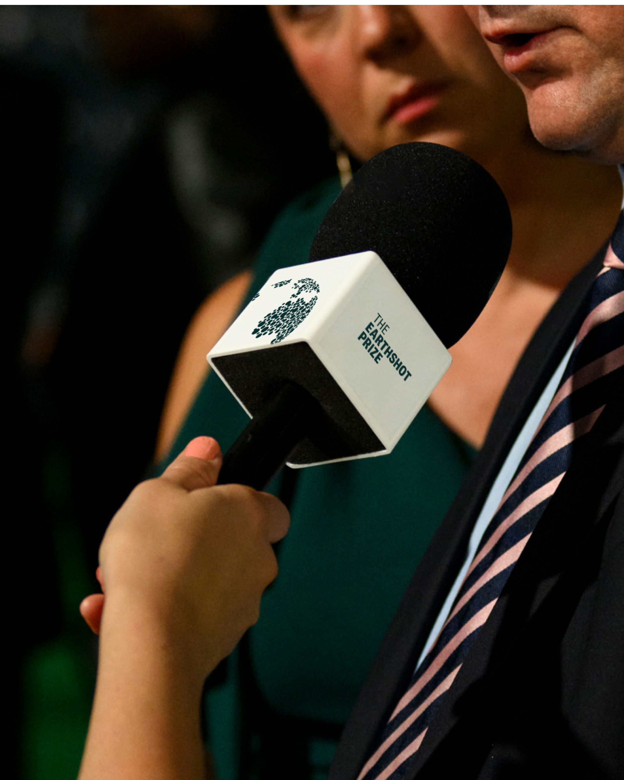 A image of The Earthshot Prize branding on a microphone for an interview for the event in Cape Town