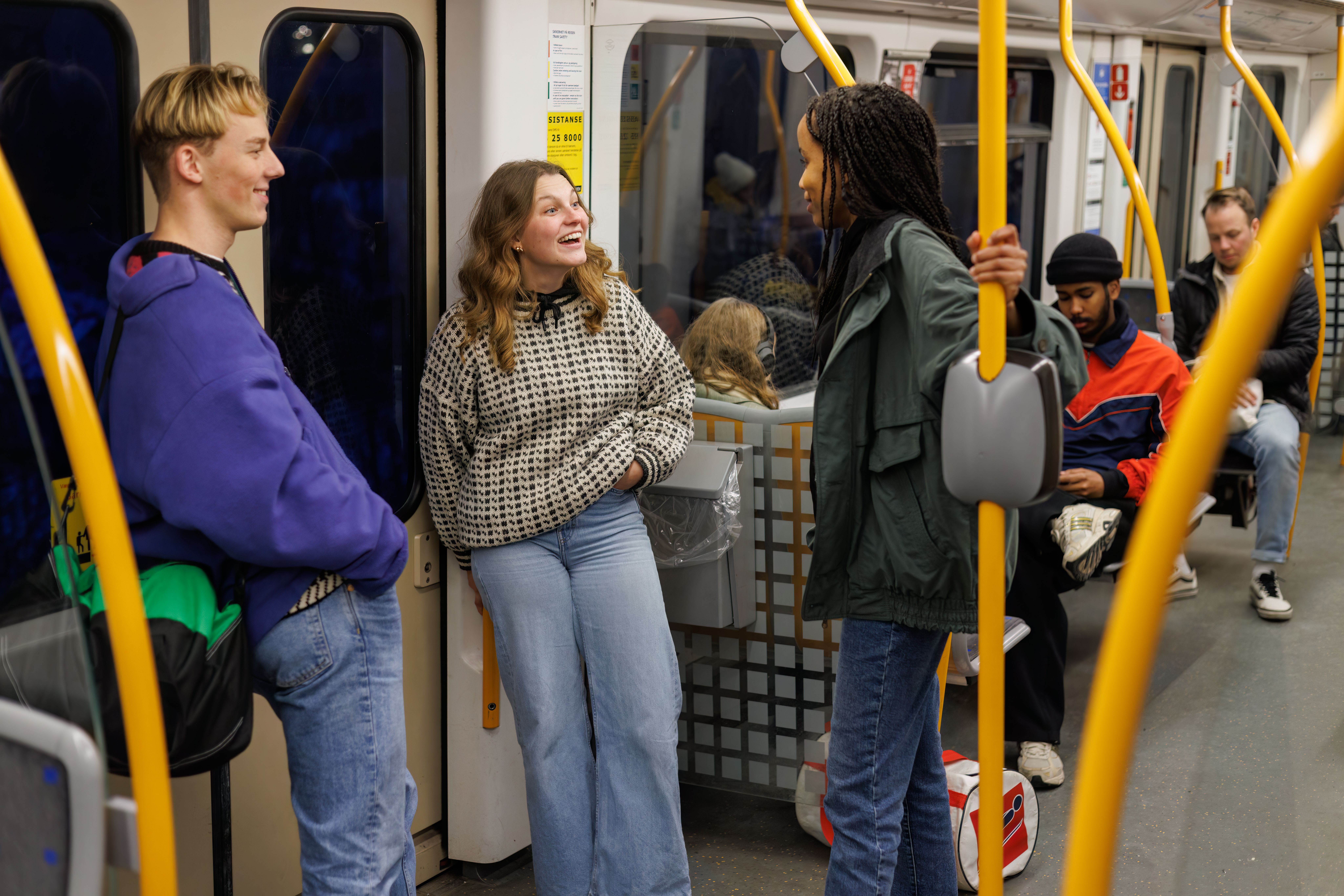 Youth travelling with the metro