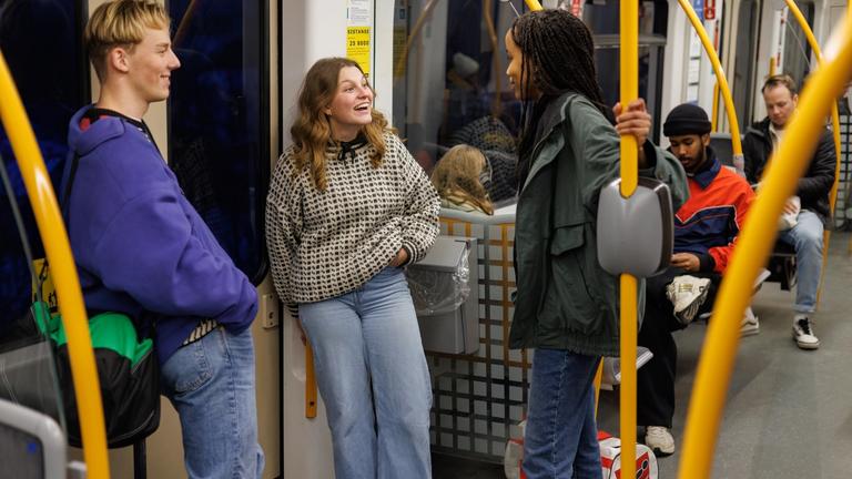 Youth travelling with the metro