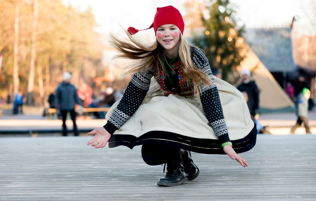 Picture of a girl dancing in a Christmas costume