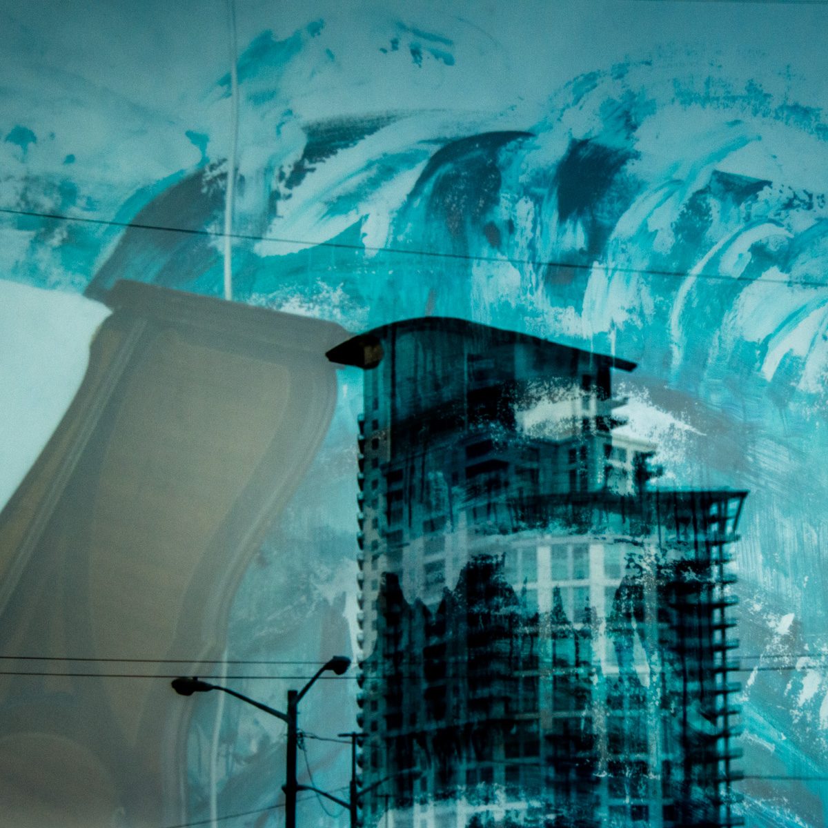 A tall dark grid-patterned block and a pale wavering slab overlap loose turquoise brushstrokes, crossed by thin black lines.