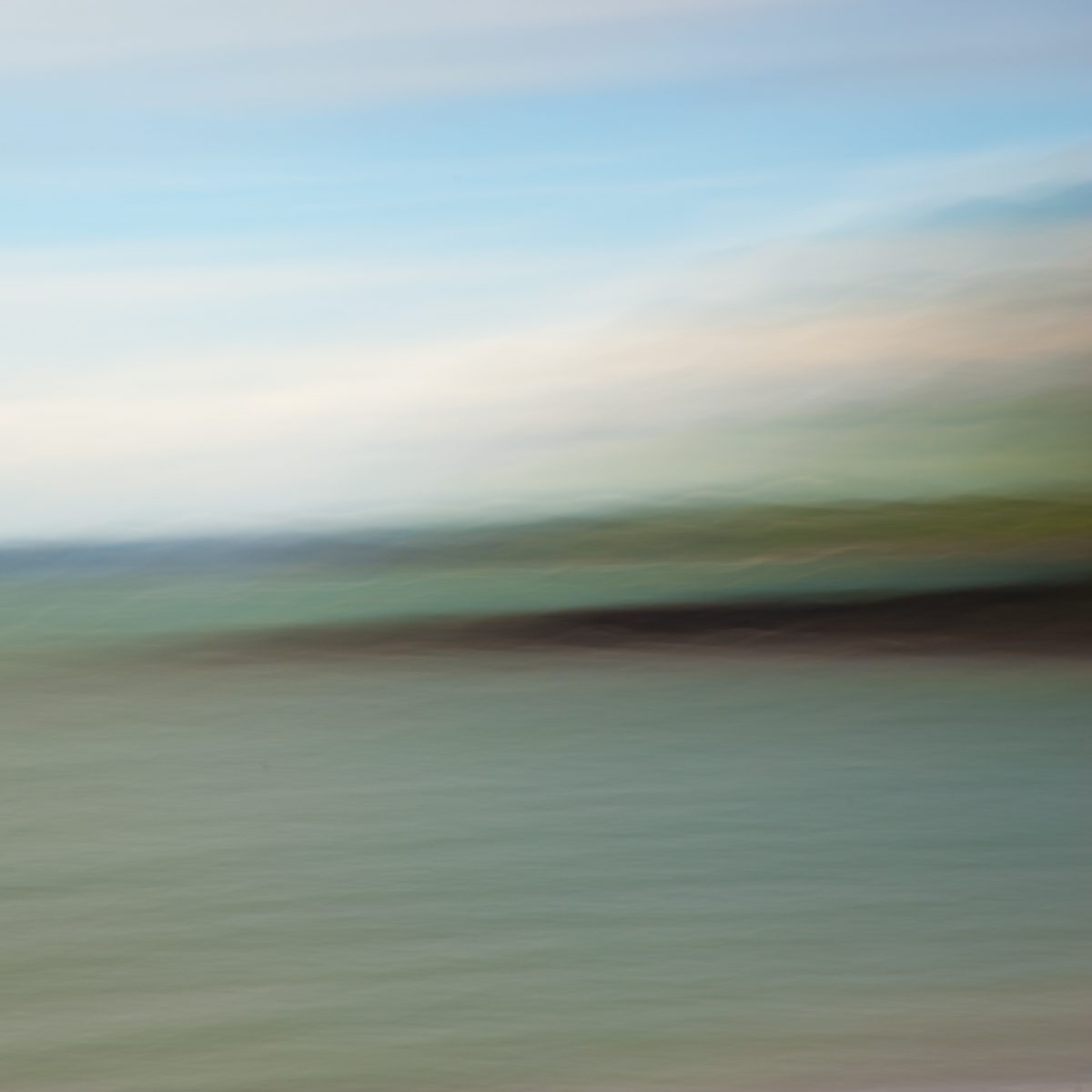 Soft horizontal bands of pale blue, cream, sage and grey-green, drawn out sideways into one long blur.