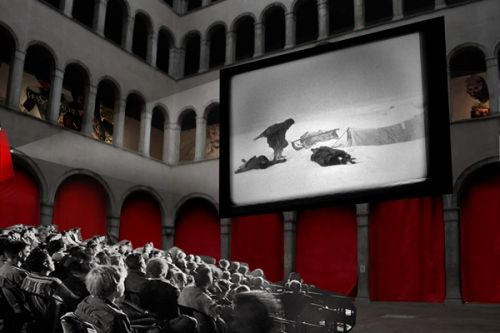 Movie screening in the courtyard open to the city, early collage