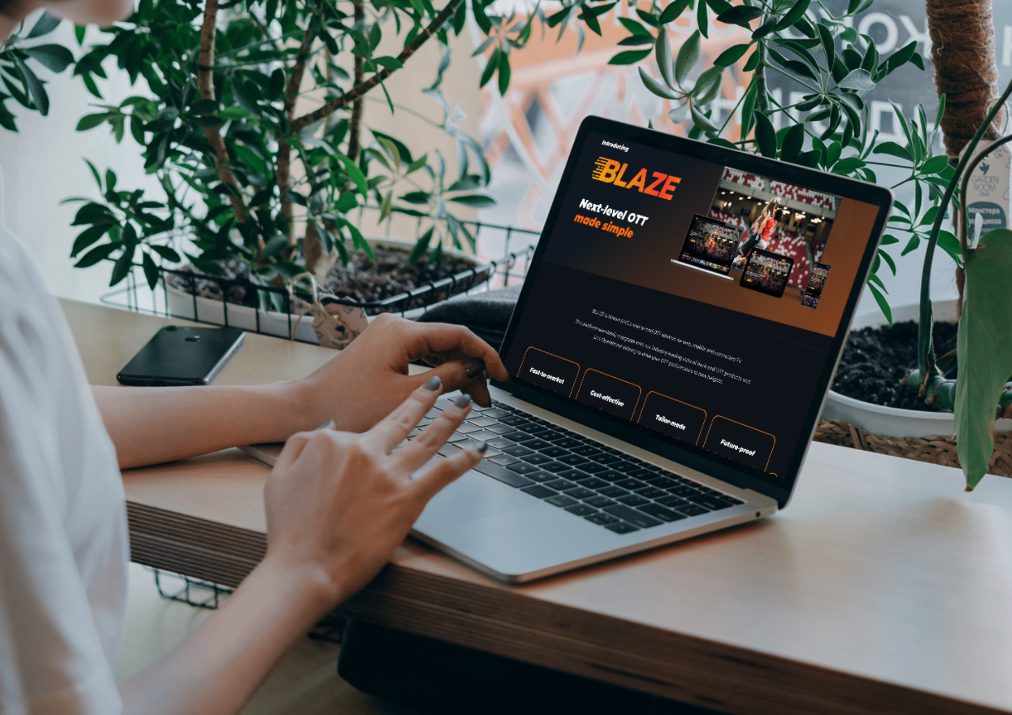 StreamAMG BLAZE OTT streaming platform interface displayed on a laptop