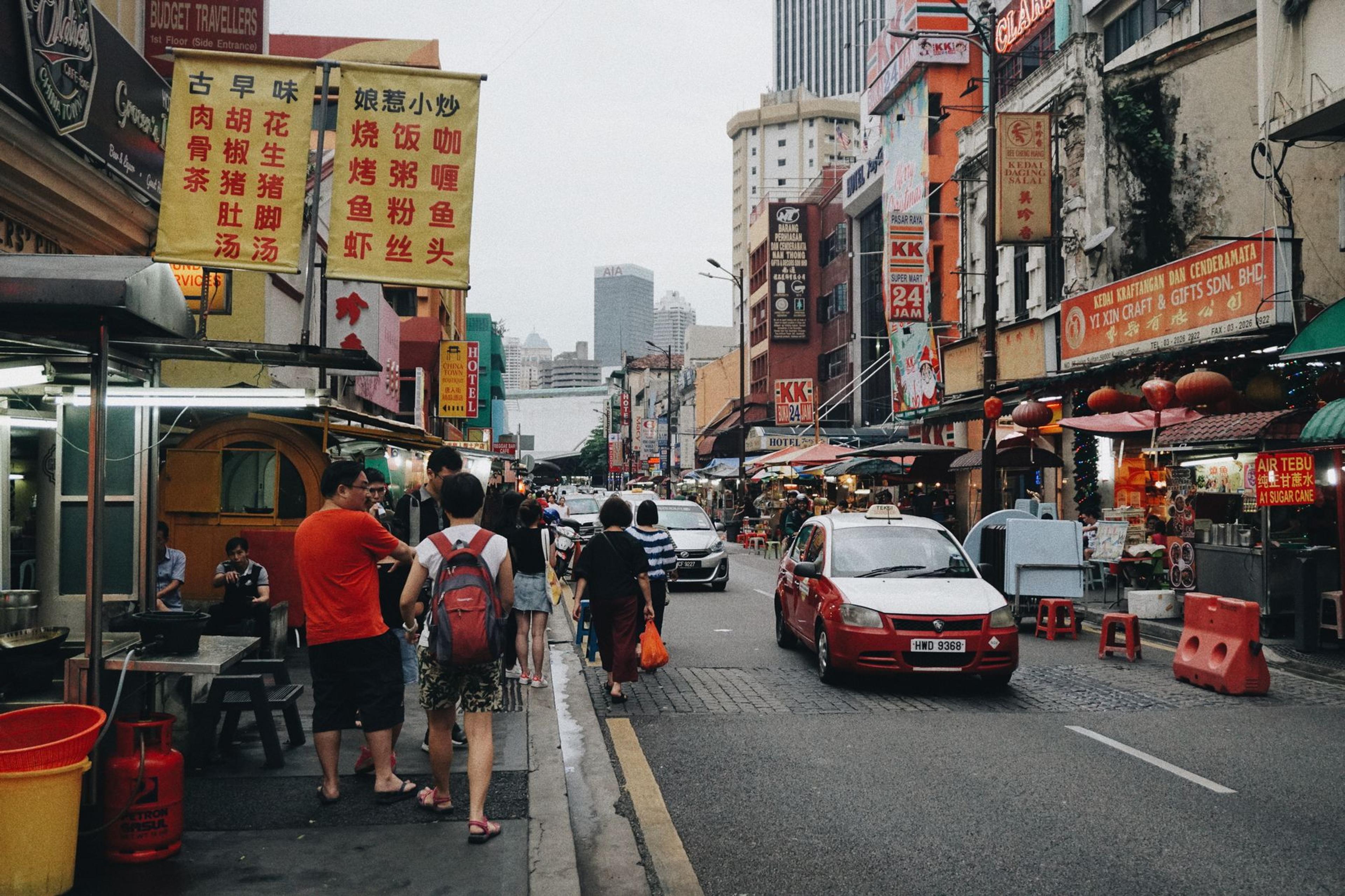 You Land in KL, You're Hungry, and the Nasi Lemak Stall Only Takes QR. Now What?