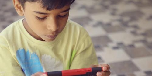 Can Schools Enable Parents to Prevent Summer Learning Loss? A Text Messaging Field Experiment to Promote Literacy Skills