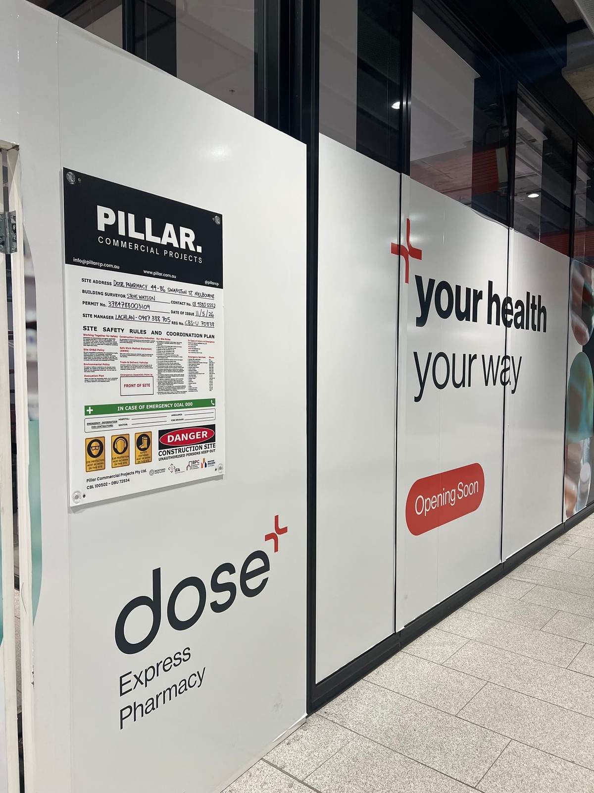 Pillar site hoarding at Dose Pharmacy, Town Hall Station