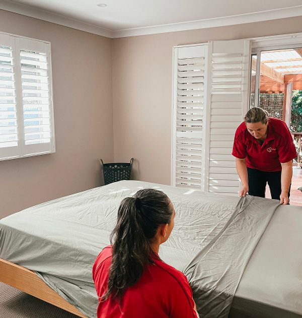 Transition Angels team making the bed