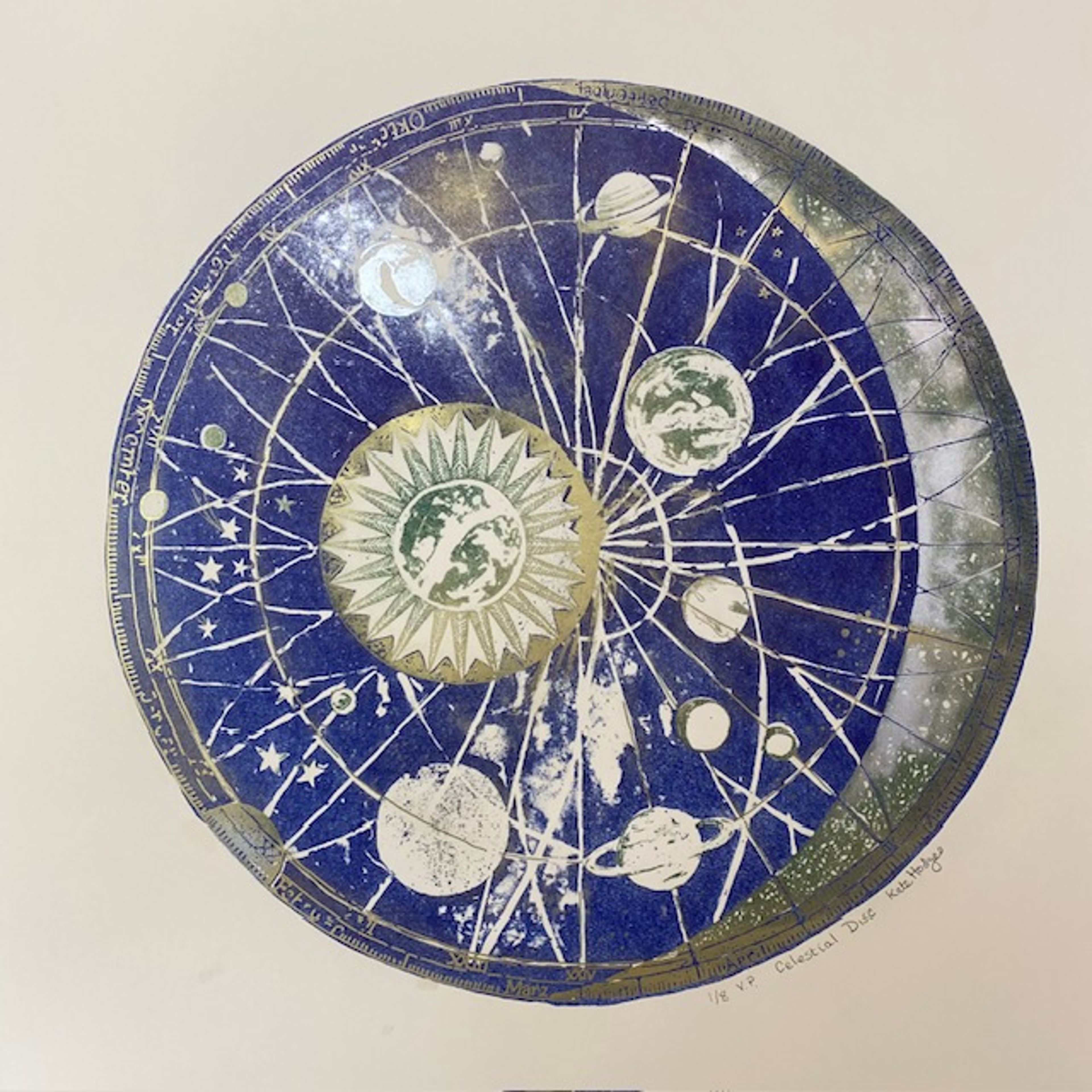 celestial image of sun and moon placements; dark blue sphere with pale yellow images