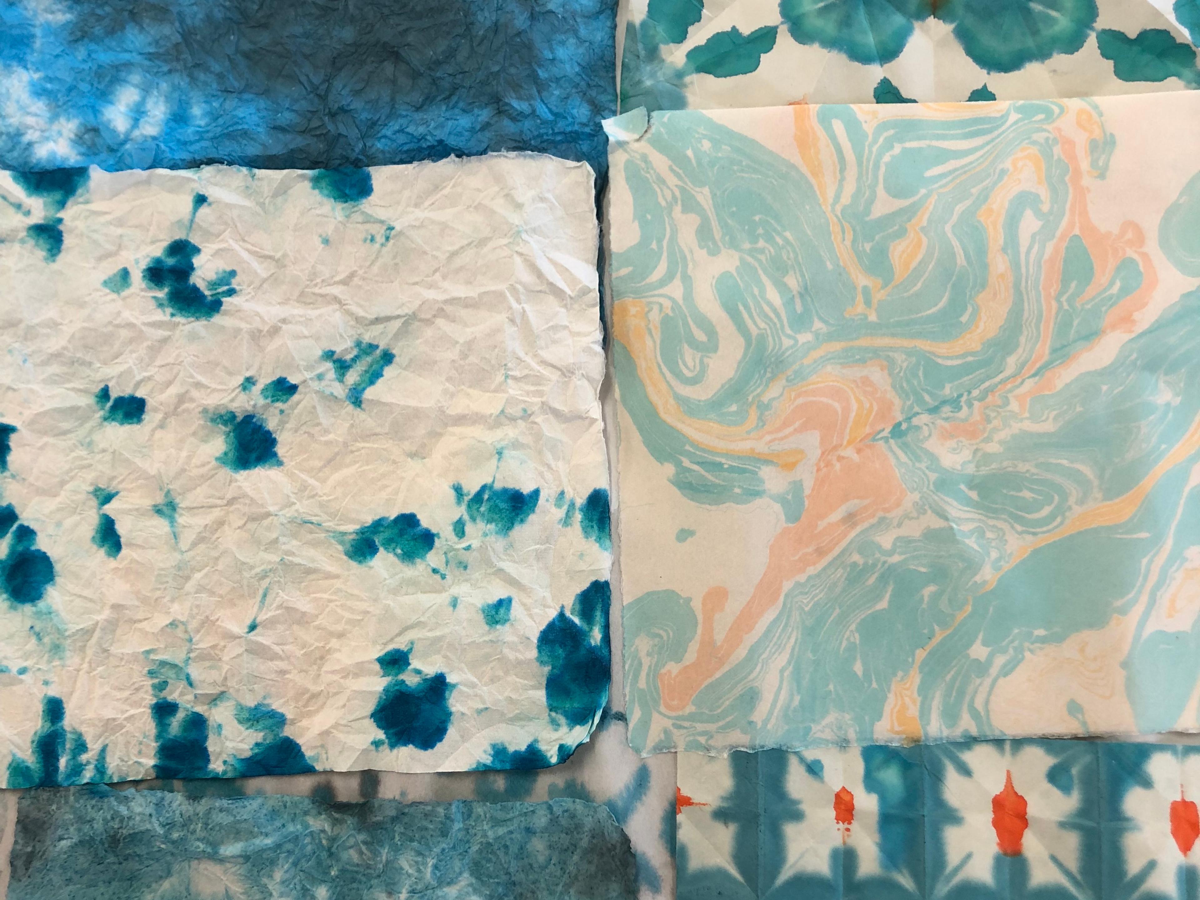 examples of marbling; multiple patterns and muted cyan colours