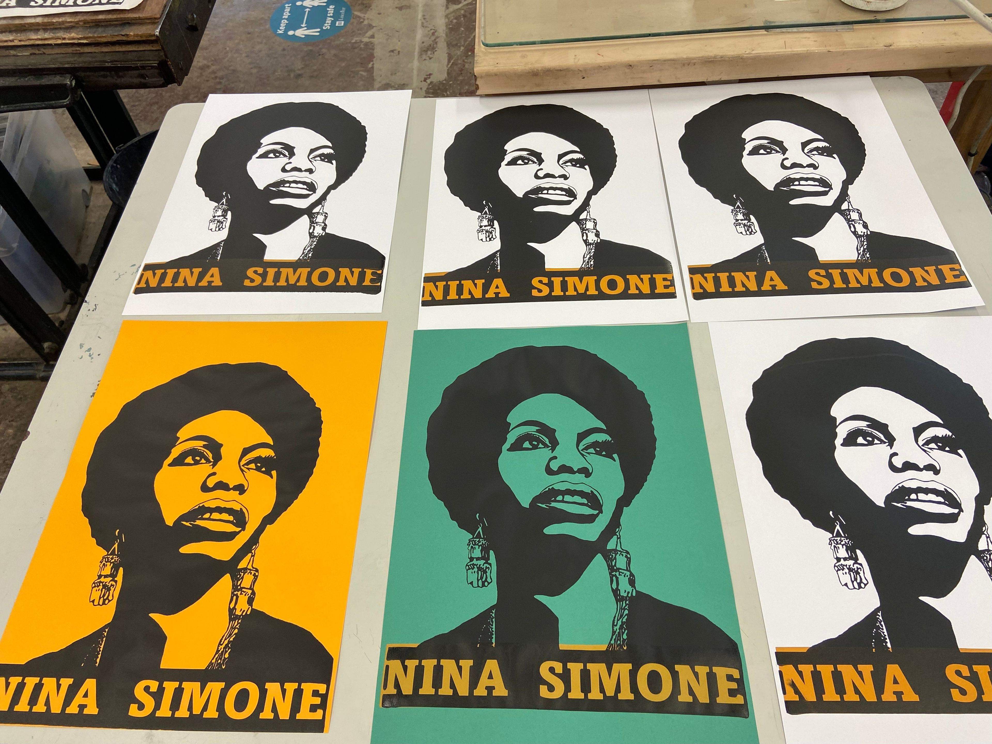 2 colour screenprints of Nina Simone on drying rack