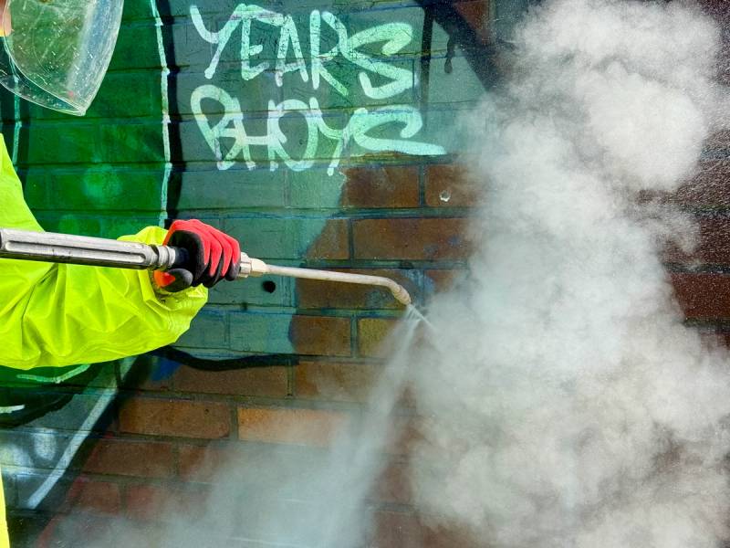 Removal of graffiti from brickwork in Glasgow