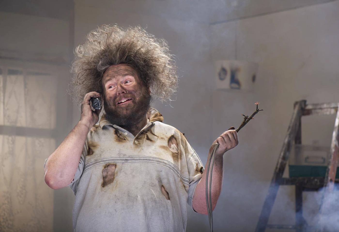Electrician testing a faulty circuit