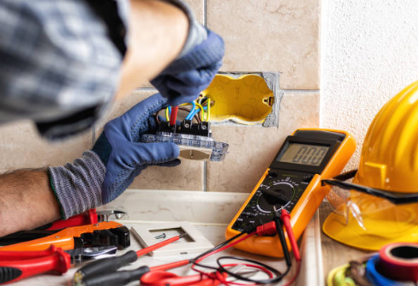 Electrician installing a power point
