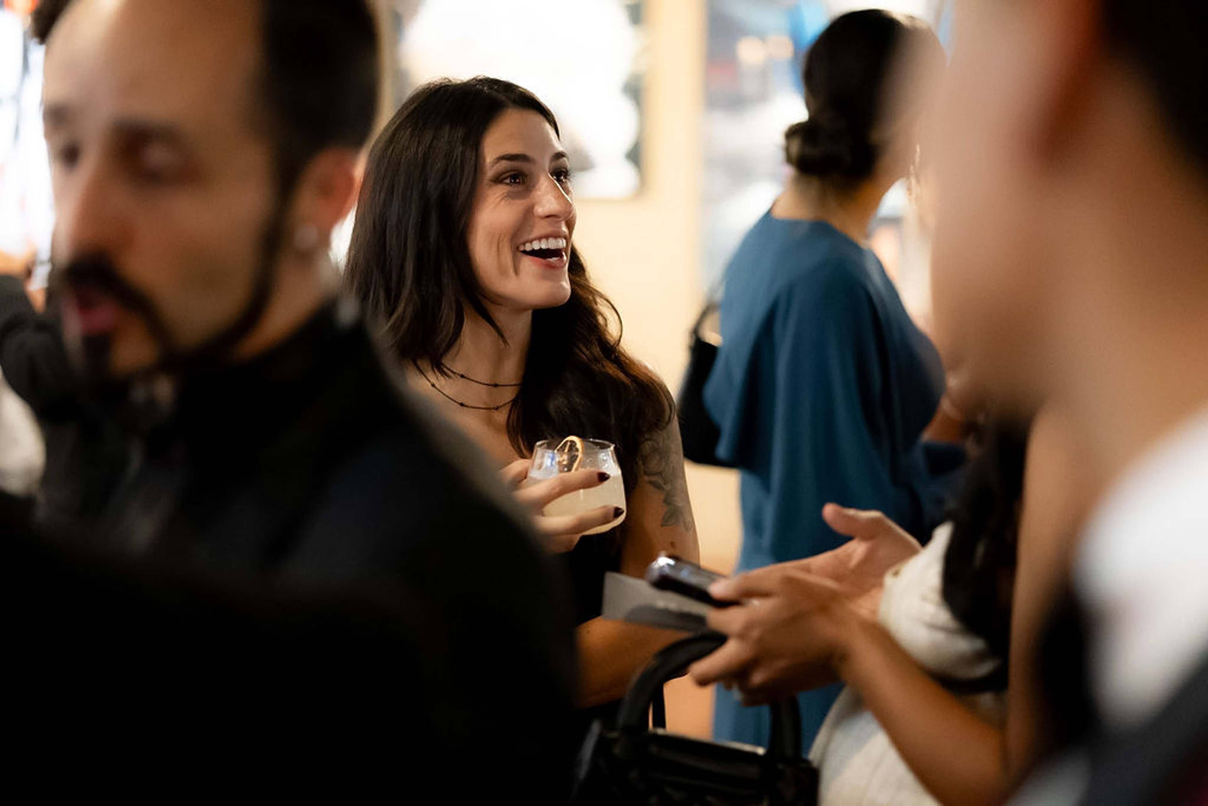 Guest laughing mid-conversation