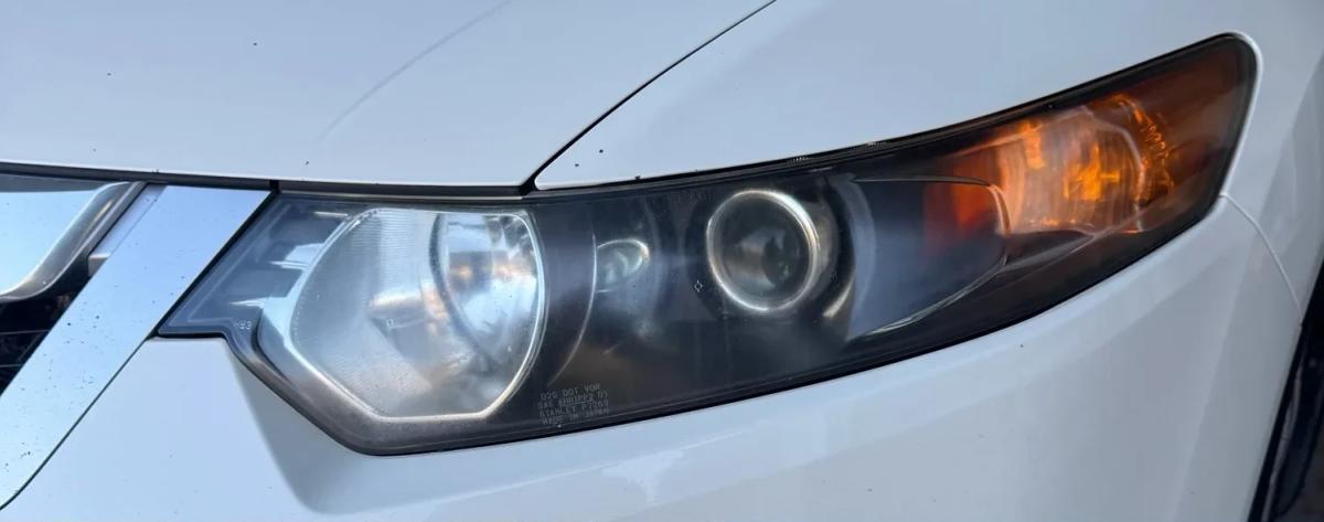 Headlight restoration sedan — before repair