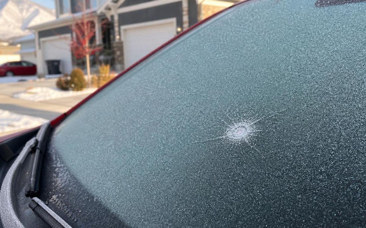 Frosted windshield with a small stone chip on a cold Utah morning