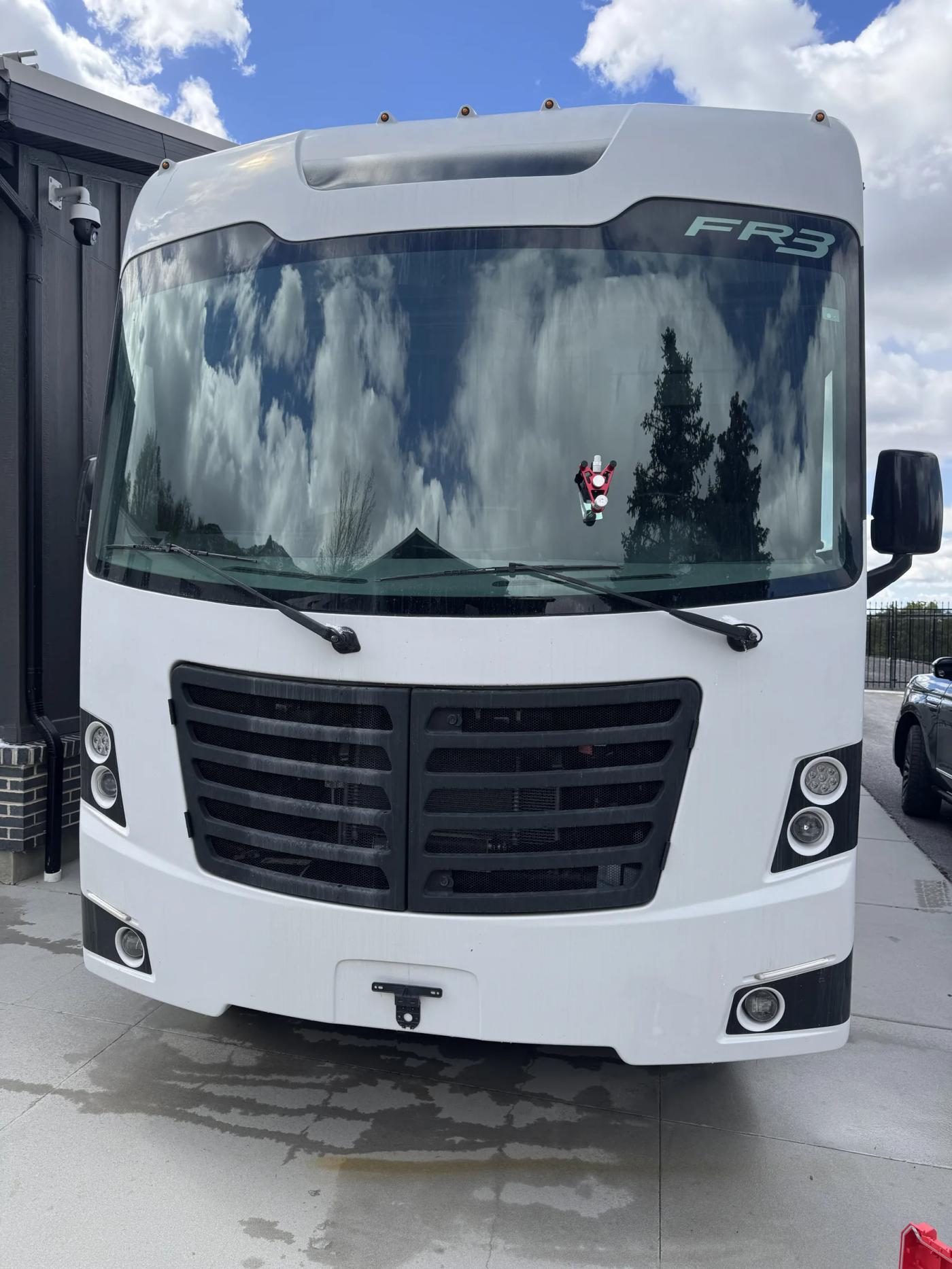 Mobile windshield repair white vehicle — RapidChip Mobile Repair