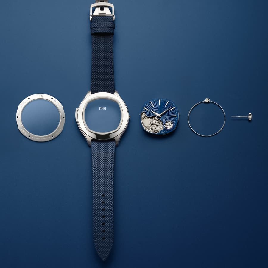 Exploded photograph of the Polo Minute Repeater case and dial components